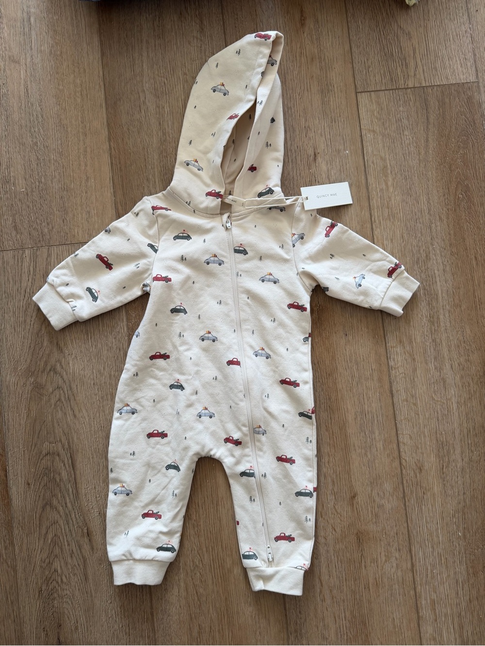Quincy Mae Cream Hooded Baby One-Piece with Car Print
